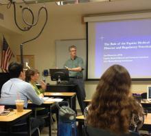 Dr. Scot Waterman speaks to a class