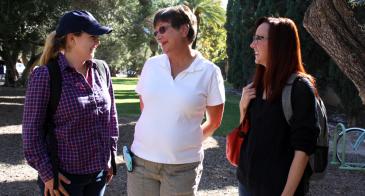 Kathy Berkey walks with students